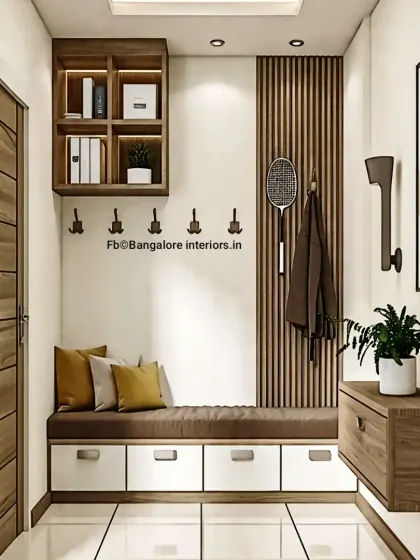A practical and stylish entryway unit with a cushioned bench and storage drawers below. The design includes coat hooks and overhead shelving, ensuring everything you need when leaving the house is in one place.