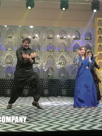 This groomsman is channeling his inner Bollywood hero. It's all about attitude and confidence on the Sangeet stage.