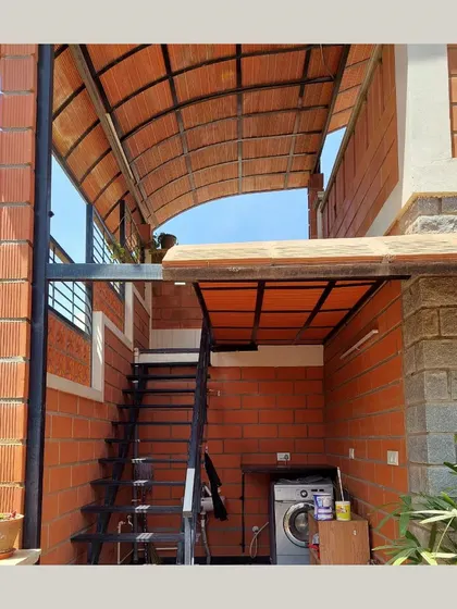 A duplicate of the external staircase and utility area.