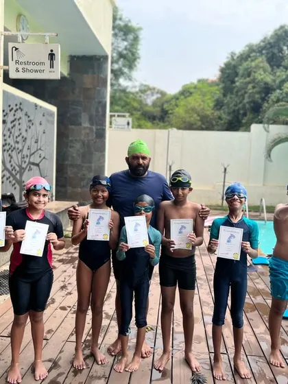 More happy swimmers with their certificates at the end of a summer session. We love seeing their pride and excitement as they achieve their goals.
