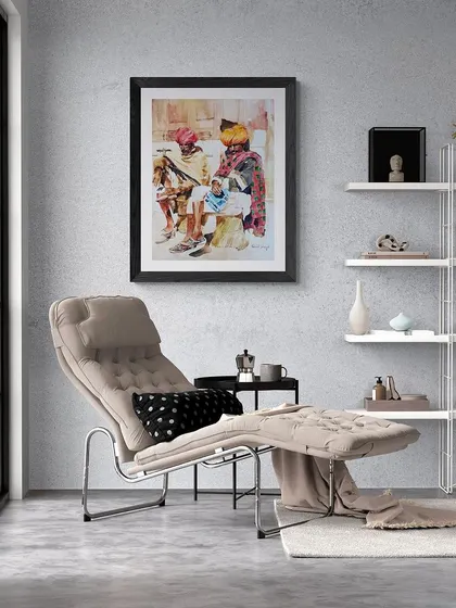 'Sun and Sand', a watercolor masterpiece showing two men from Rajasthan. This piece is shown here in a modern living space, demonstrating how traditional themes can complement contemporary decor.