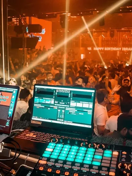 This is my view from the DJ booth at a packed night in Kolkata. My goal is to connect with the crowd and create a non-stop energy wave, and this image captures that moment perfectly.