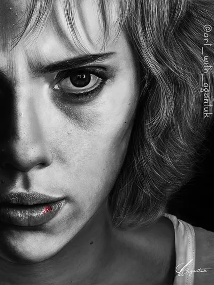 Another version of my portrait of Lucy, with a single touch of red color on her lip. This selective color technique in a black and white image helps to draw the viewer's eye and add a focal point to the story.