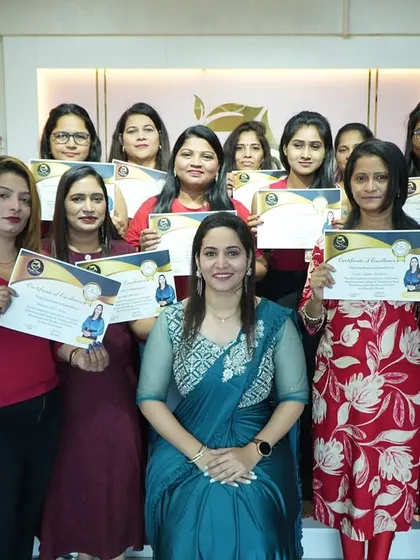 A group photo with another successful cosmetology batch. Seeing them all certified and ready for the industry is my greatest reward.