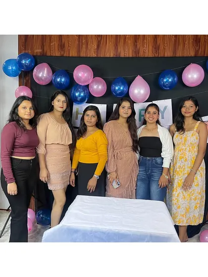 A group of students posing during our Children's Day party. Building a strong, happy community is important to me.