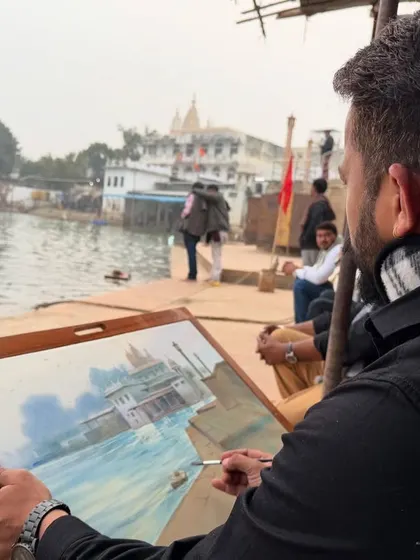 Me at work on the Pushkar ghat painting. Painting on location allows me to directly observe and react to the changing light and colours.