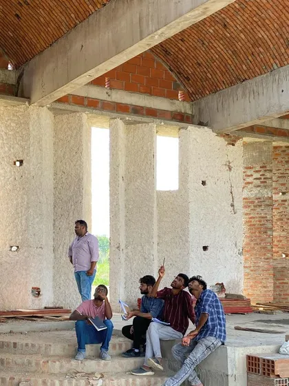 Our team discussing design details on site. These visits are essential for learning and problem-solving, ensuring the architectural vision is executed perfectly.