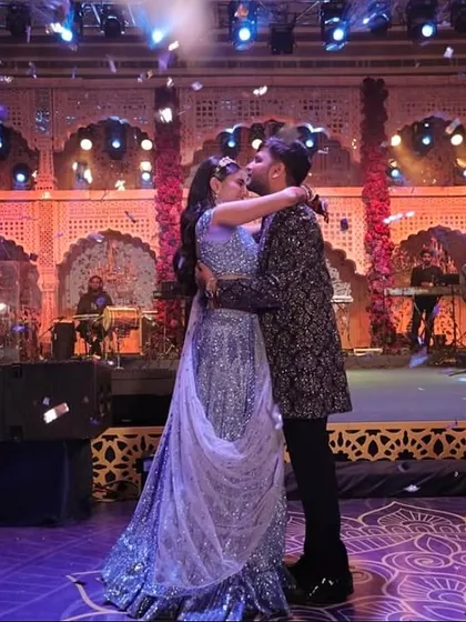 An unscripted, romantic moment between the bride and groom at the end of their performance. It's these genuine connections that make a Sangeet truly special.