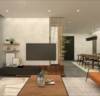 This angle shows how a simple screen partition can create a sense of separation in an open-plan layout without blocking light. The natural theme continues with wood furniture, plants, and a neutral color scheme for a relaxed, modern tropical vibe.