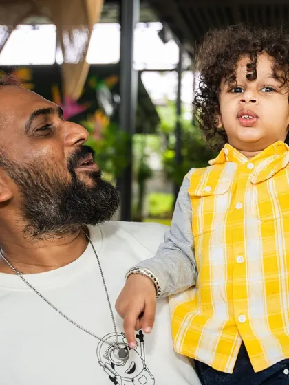 A father and son sharing a special moment. Our space is perfect for family bonding.