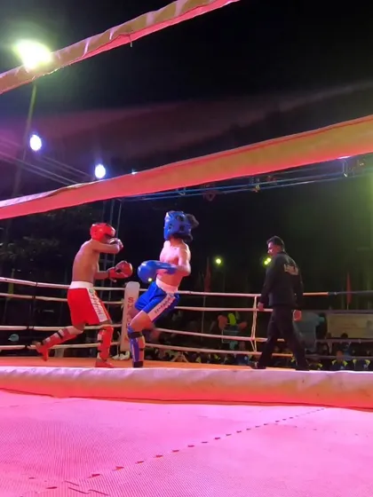 Subhan evades a strike and prepares to counter. Smart fighting on display.