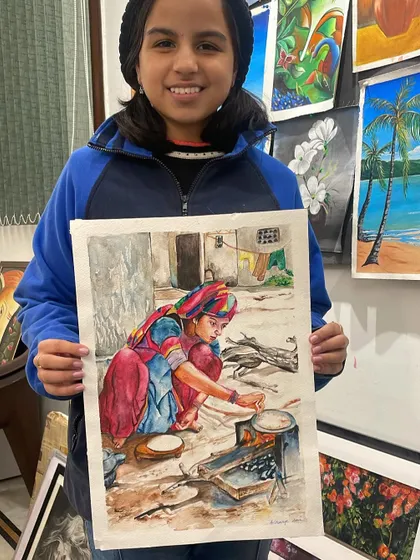 This watercolor painting of a woman cooking outdoors tells a wonderful story. The student learned to capture a sense of place and culture through her art.