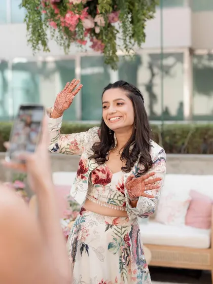 A fun, candid shot of the bride. Her makeup is designed to look great in every photo, capturing all the joy of the day.