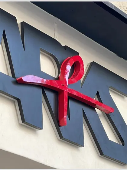 The exterior signage for ARKS, featuring the brand's distinctive logo. The three-dimensional design creates a strong first impression before customers even enter the store.