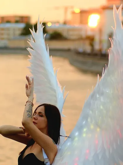 Another beautiful sunset shot with the glowing angel wings. These photos capture a feeling of peace and magic.