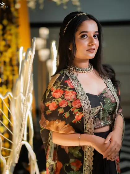 A portrait of the bride looking stunning in her floral Sangeet outfit, ready for a night of music and dance.
