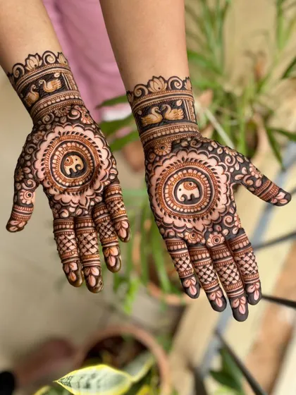 An alternate angle of the beautiful and traditional engagement mehendi.