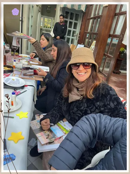 A happy moment from a transformative Sunday Vision Board party. It's an inspiring afternoon where everyone unleashes their creativity, enjoys uplifting conversations, and leaves with a tangible reminder of their goals.