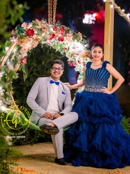A fun and formal pre-wedding look. I styled the groom in a light grey suit with a blue bow tie to perfectly complement his partner's royal blue gown.