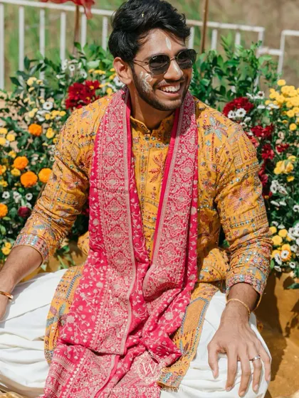 This Haldi ceremony was a burst of color and unforgettable moments. We used vibrant tissue flowers, playful origami birds, and colorful smoke bombs to bring the venue to life.