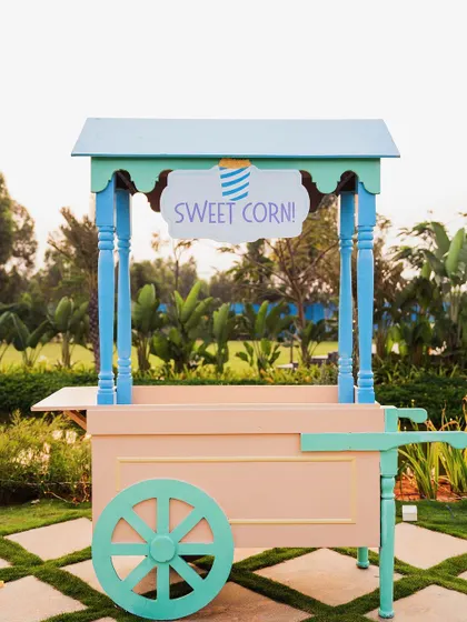 A sweet corn cart designed in soft pastel colors to match the carnival's theme. I can source or create custom food carts for any type of treat you'd like to offer.
