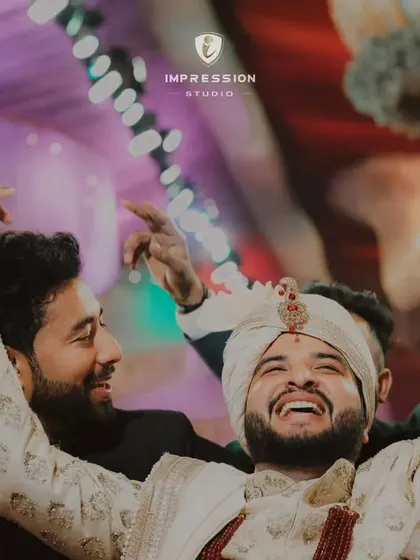 Pure exhilaration on the dance floor. This shot of the groom and his friends captures the high energy and celebratory spirit of an Indian wedding baraat.