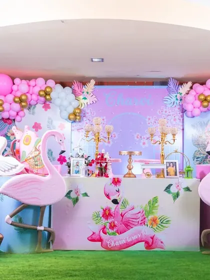 A flamazing 10th birthday for Charvi! This tropical flamingo party is filled with vibrant pinks, lush florals, and elegant golden details, creating a chic and fun celebration.