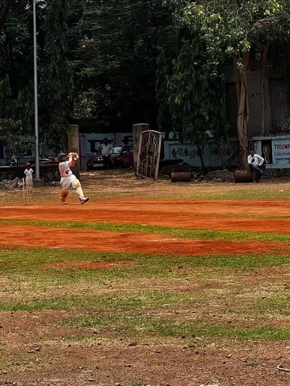 A batsman plays a powerful shot during the Triumph Little Champs Tournament. Our grass and soil pitches provide a realistic playing surface for competitive matches.