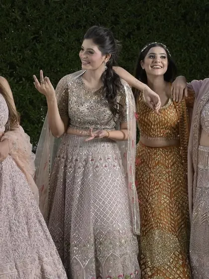 Another fun and candid group shot, highlighting the beautiful details and flowing silhouettes of our contemporary lehenga collection.