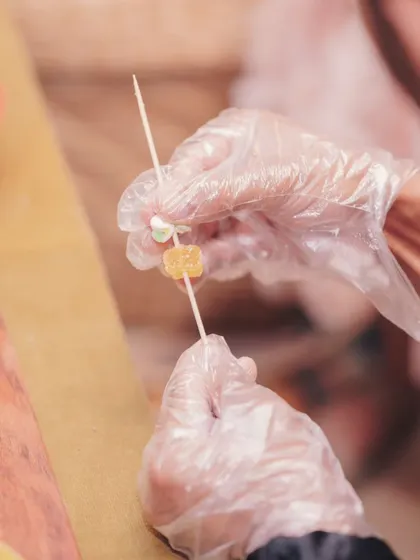 A hands-on activity station where kids could create their own candy skewers. I provide all the materials for safe, creative fun.
