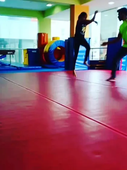Our advanced grade schoolers practicing their skills. These action shots capture the dynamic movements and focus required for higher-level gymnastics.
