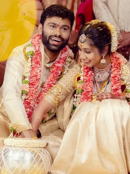 For this lovely couple's wedding ceremony, I designed coordinated outfits in classic cream and gold Kanjivaram silk. The goal was to create a timeless and elegant look that symbolized their new beginning together.