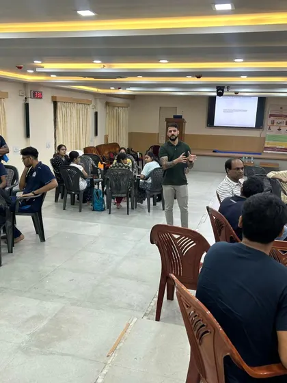 Presenting during the workshop. My goal is to bridge the gap between academic research and practical application for coaches and athletes.