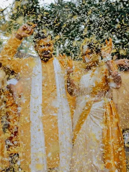 The sheer joy and messiness of a Haldi ceremony. We love capturing the candid reactions as friends and family shower the couple with love and turmeric.