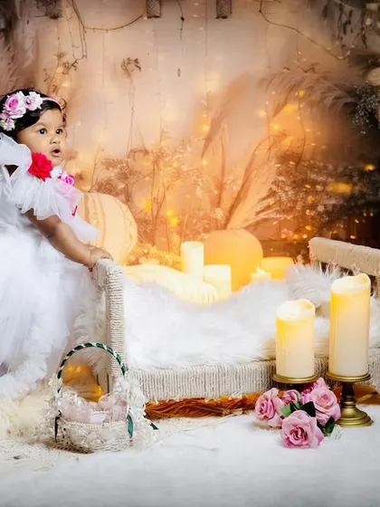 Another angle from a fairytale-themed shoot, showing the little girl interacting with the set. I encourage children to explore the props, which often leads to the most natural and beautiful photos.