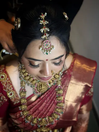 A high-angle shot showcasing the matha patti and the beautiful winged eyeliner.