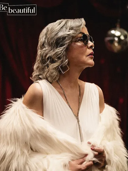 Channeling a retro disco vibe for the Be Beautiful editorial. The combination of the white dress, faux fur, and disco ball created a glamorous, nostalgic look.