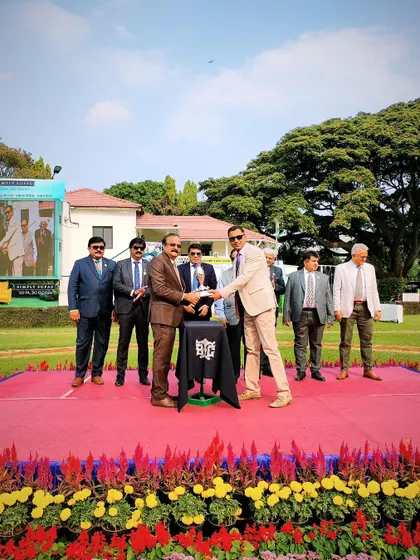 The Governor's Trophy is presented to the winning connections.
