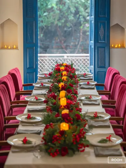 I design spaces for connection and celebration. This long table, set for a festive gathering, shows how our elegant interiors can be transformed for your special group events and private dining.