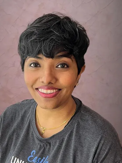 This is a great no-fuss pixie style for super thick hair. It's short, easy to manage, and always looks great.