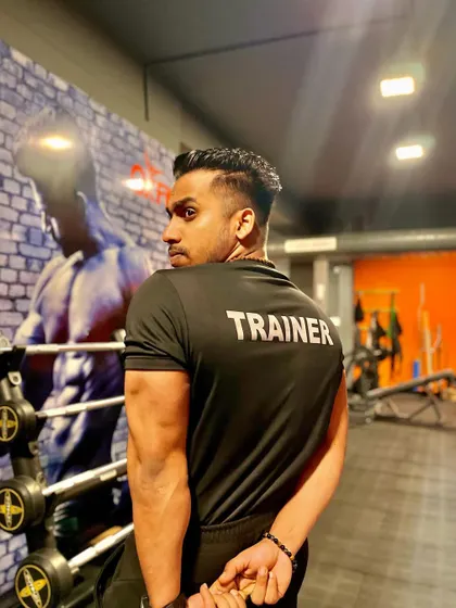 The pain you feel today will be the strength you feel tomorrow. A shot of me in my "Trainer" shirt, ready to help you push through the pain to find your strength.