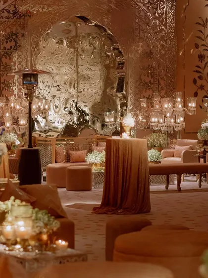 The main hall for the Sufi night, featuring a spectacular mirrored archway that reflects the candlelight beautifully. We used plush, low seating in pastel tones to create a comfortable and opulent lounge feel.