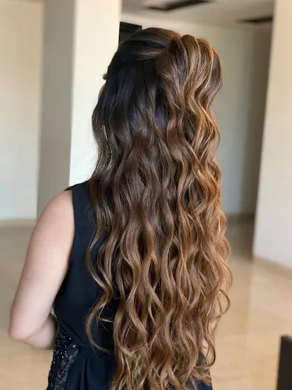 Another take on the open half-tie look. The volume at the crown and the long, flowing waves are all thanks to the seamless integration of my hair extensions.