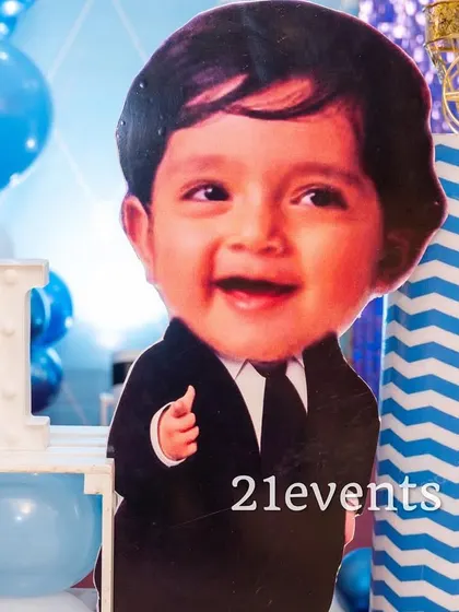 A personalized face cutout is a fun and quirky detail that always makes guests smile. This one was for a Boss Baby theme.
