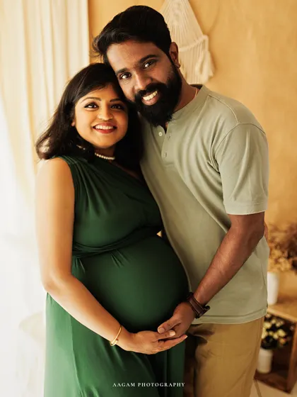 A classic portrait from a lifestyle maternity session. The couple's warm smiles and the soft, natural light create a timeless and heartfelt image.
