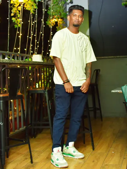 A full-length shot showing my street style. My look is part of my brand, reflecting a modern and cool aesthetic.