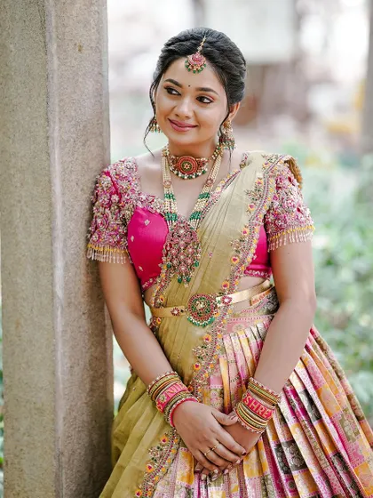 A beautiful portrait of a client during her pre-wedding festivities, wearing a stunning layered necklace set.