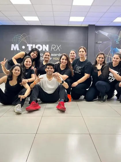 This is my MotionRX family! After a killer choreography session, we always take a moment to celebrate our hard work. The smiles and support in this room are what make our community so special.