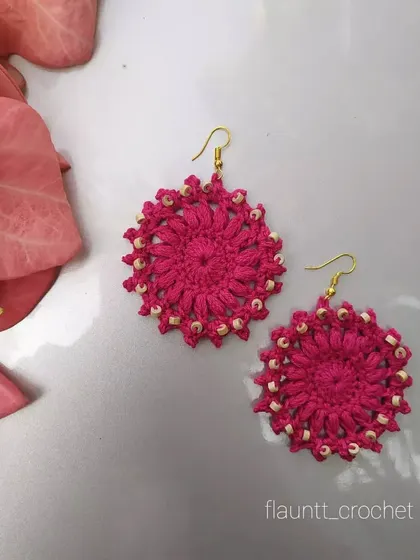 These bright pink beaded earrings have a beautiful floral or sunburst design. They are ready to ship or can be made in bulk for resellers or gifts.