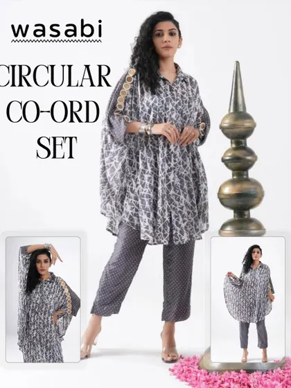 This is our Circular Co-ord Set in a charcoal grey shibori print. I chose a fluid cotton silk for this comfort-fit shirt and paired it with straight polka pants. To make it special, I added delicate Patra hand embroidery to the shoulders for a touch of quiet strength.